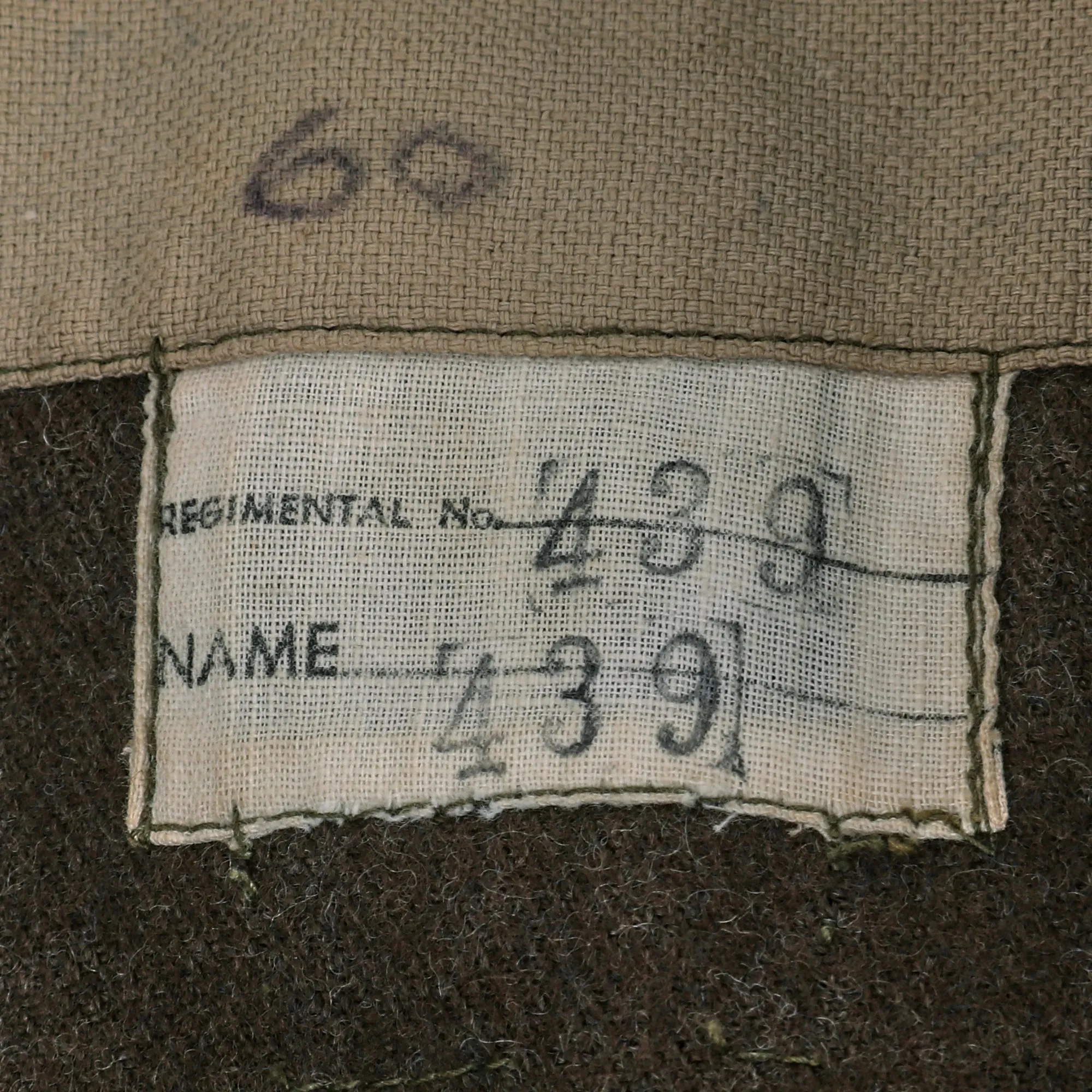 Original WWII Second Australian Imperial Force P-1917 Tunic Dated 1942 with 1945 Dated Wool Greatcoat Both With Insignia - 2 Items